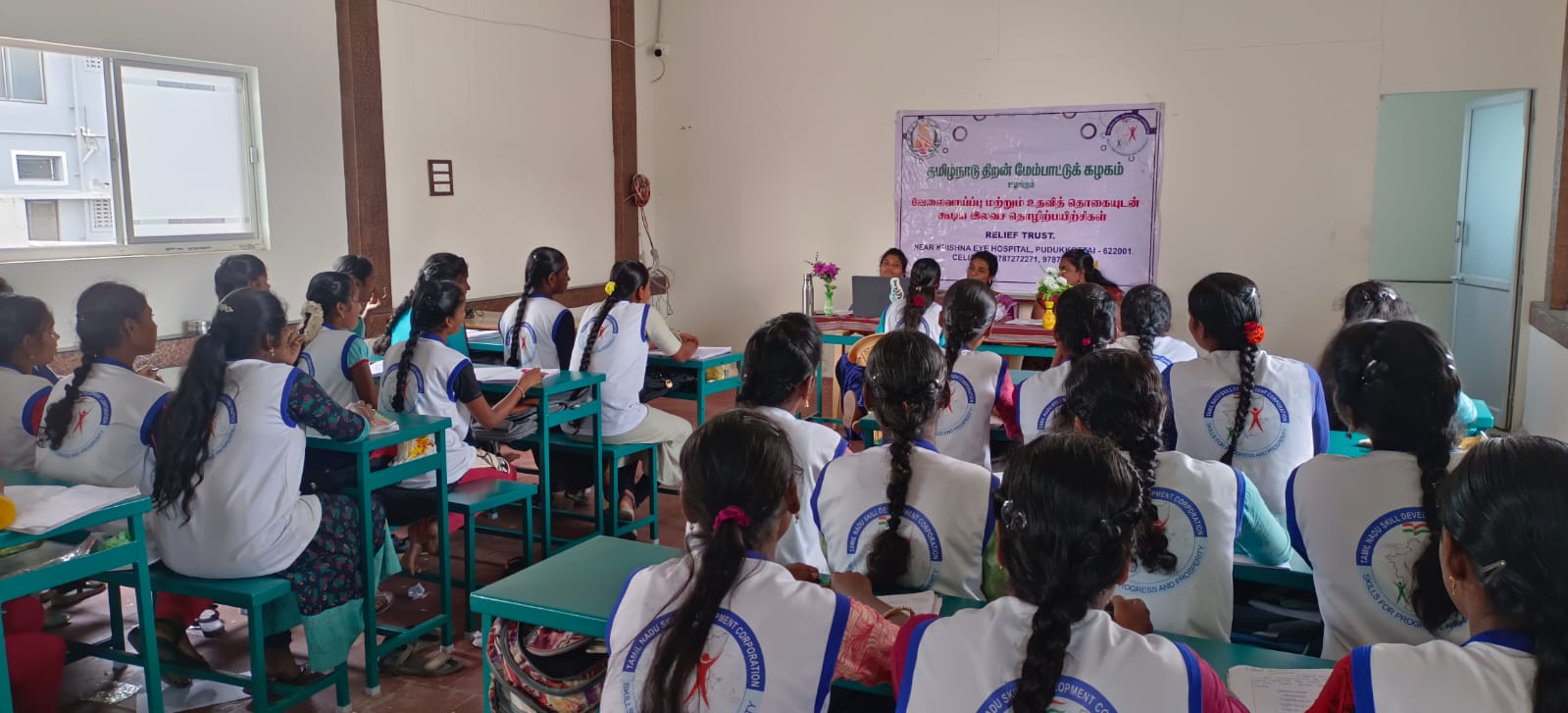 Relief Trust training class with students